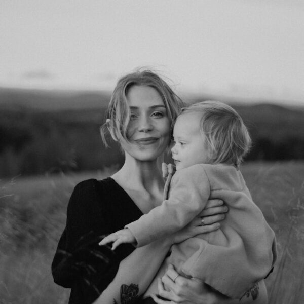 black and white portrait of mother and child outdoors