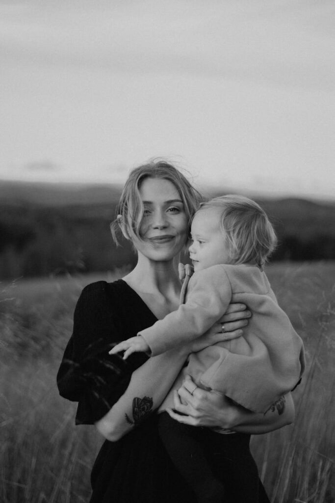 black and white portrait of mother and child outdoors